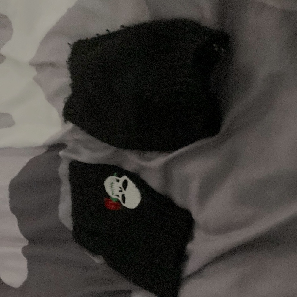 Black arm sleeves with skull